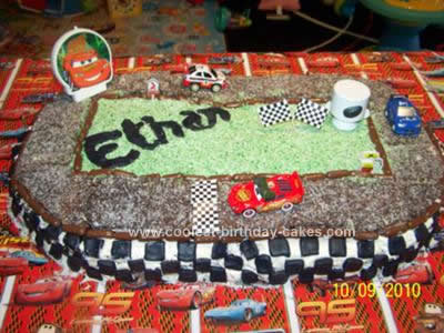 So his Godmother Jodie and I came up with this Disney Cars Race Track Cake
