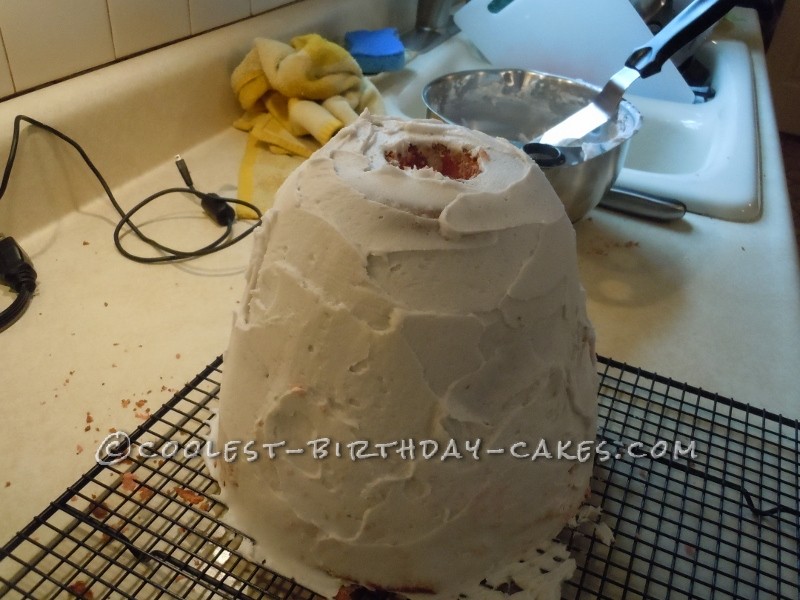 Crumb coat of frosting then in the freezer.