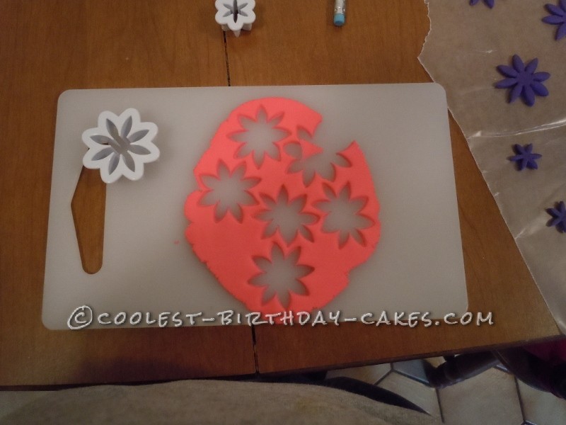 While you wait for the cake to chill a bit, make your decorations and tint your frosting.
