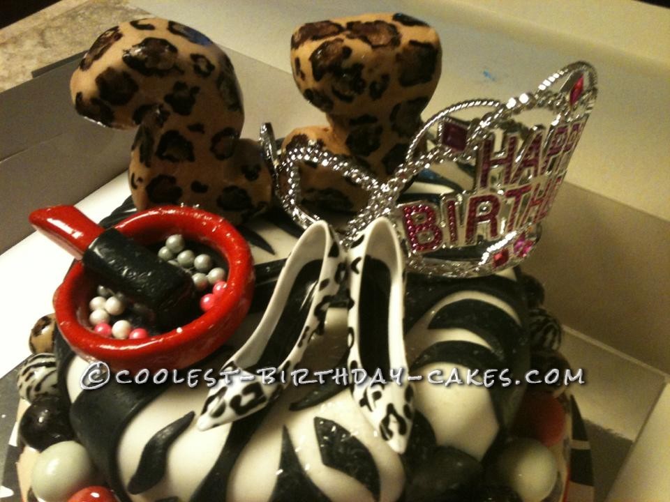 up close pic of the top of leopard and zebra cake
