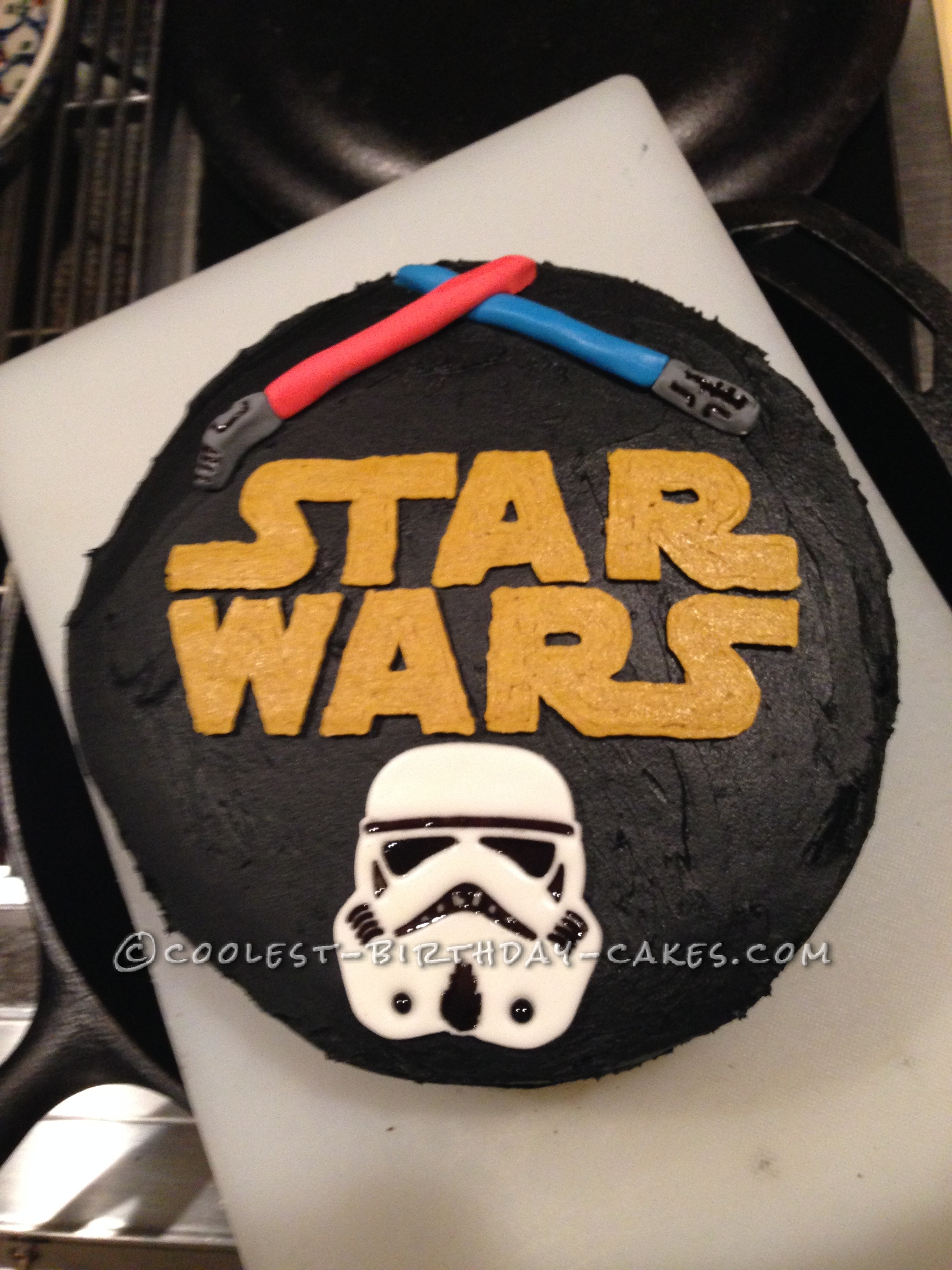 Star Wars Storm Trooper and Lightsaber Cake