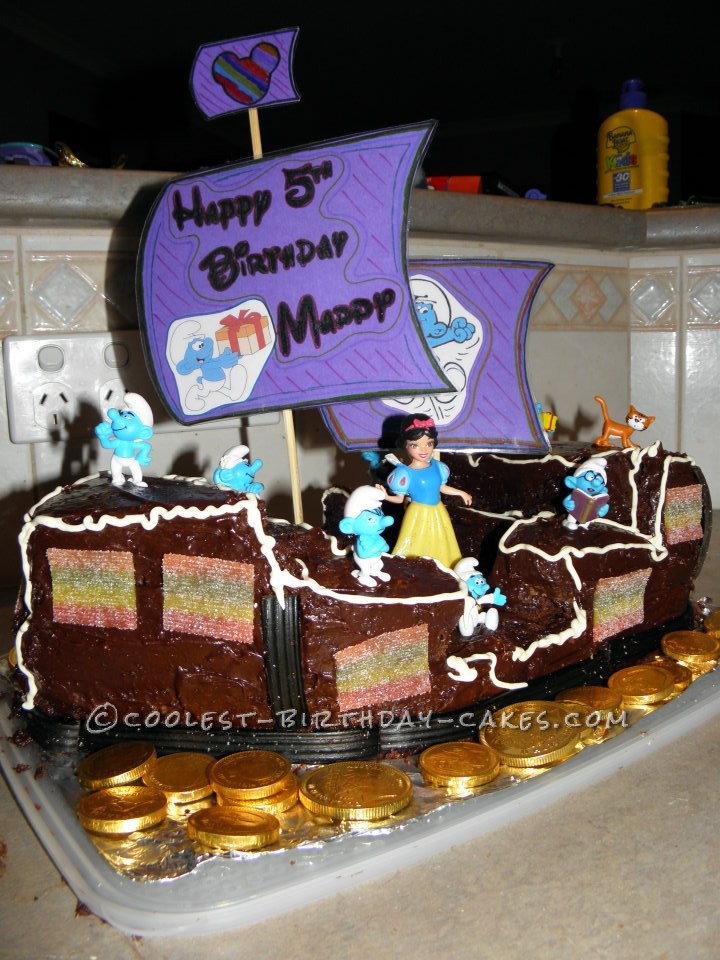 Snow White and the Seven Smurfs on a Pirate Ship Birthday Cake