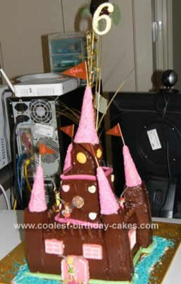 coolest-fairy-castle-birthday-cake-455-21383378.jpg