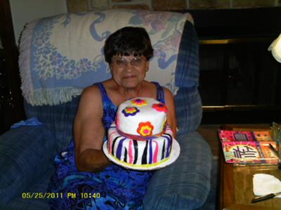 my aunt with her cake