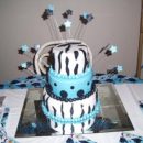 Zebra and blue graduation cake